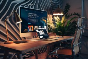 Poste de travail moderne dédié au web design et au graphisme chez Média Créations.